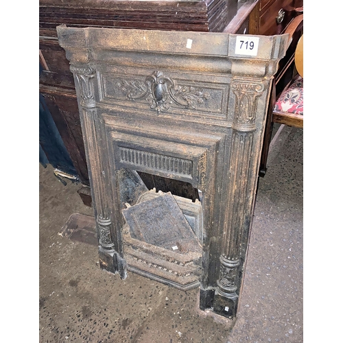 719 - Cast iron fire place