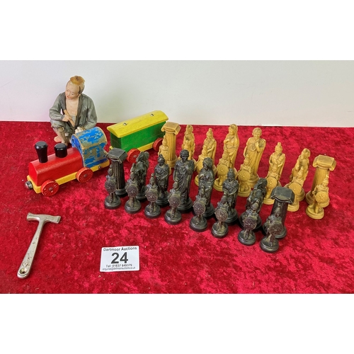 24 - Resin chess set, oriental figure and two wooden trains