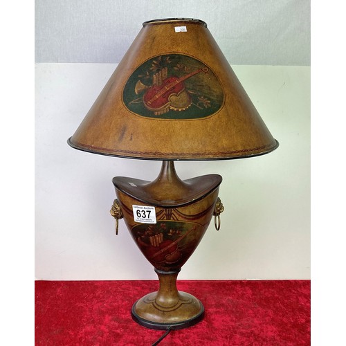 637 - Large lamp with metallic shade, both with a matching muscial design, approx 66cm tall from base to t... 