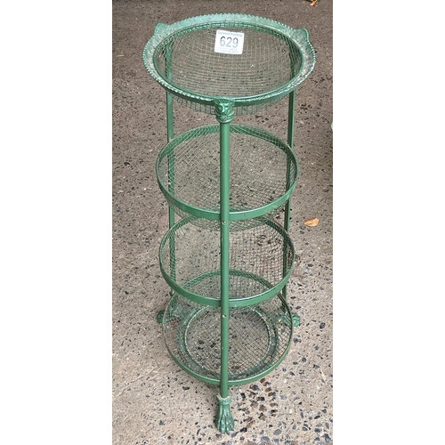 629 - Greem metal vegetable rack with four tiers