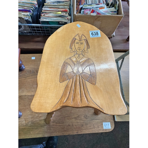 638 - Rustic carved wooden stool with a carved Nun design