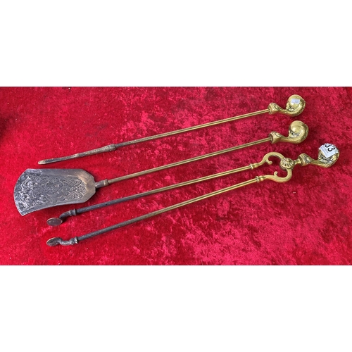 633 - Very impressive brass three piece companion set with claw and ball design