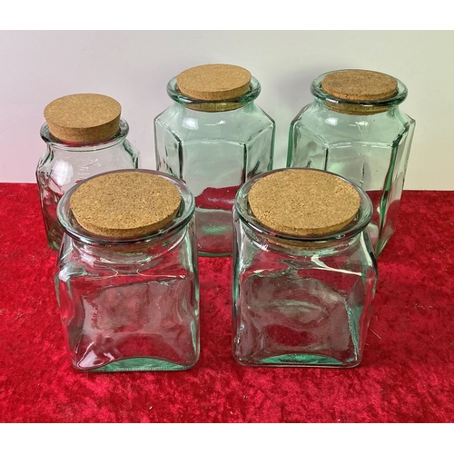 779 - Five good heavy glass storage jars with cork lids