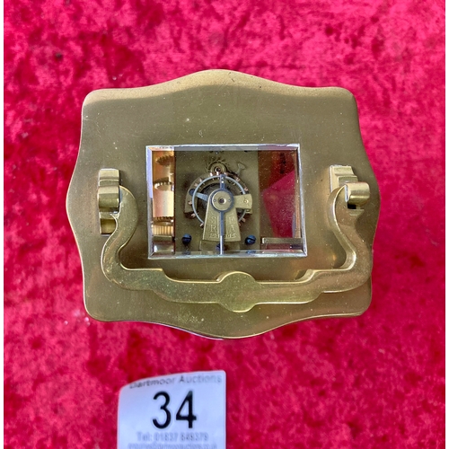 34 - Small French brass cased carriage clock with key