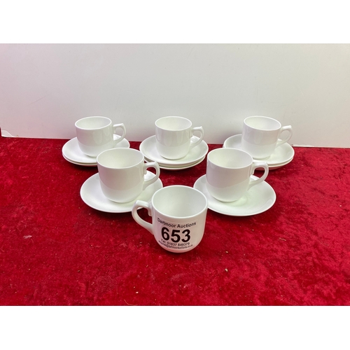 653 - A white Sutherland bone china coffee set in good condition.