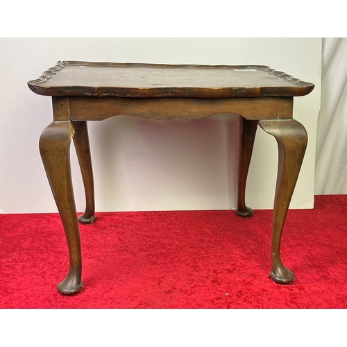 650 - A small antique coffee table