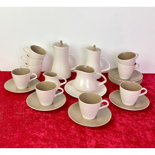 10 - A fabulous retro coffee set including cream and milk jugs , coffee pot and hot water jug, 9 cups.