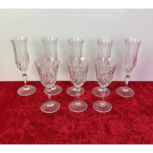 7 - A lovely set of Champagne flutes x 5 and 3 white wine glasses.