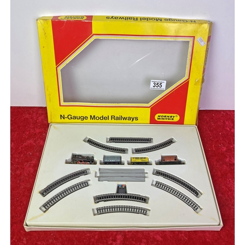 355 - Hornby minitrix Train Set N Gauge Locomotive plus three wagons and track