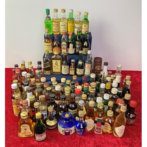 430 - Two baskets of bottle miniatures