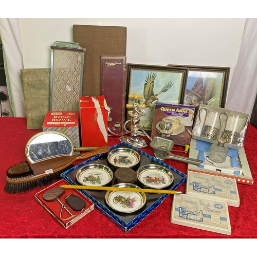 731 - Assorted box of various goodies including candlelabra and a vegetable mincer, some party game sand s... 