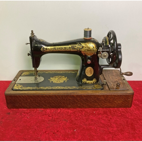 742 - A vintage, Singer hand sewing machine in original box in good order