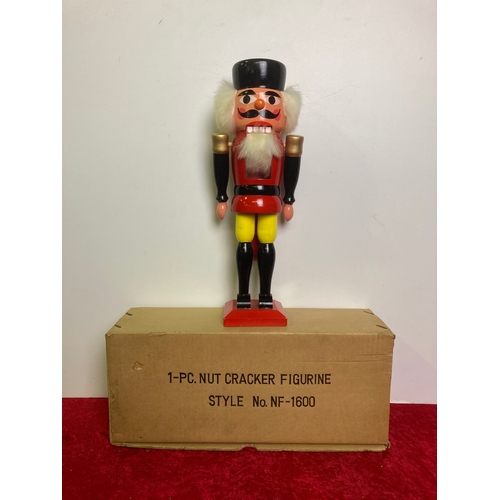 1199 - Boxed wooden nutcracker toy, in the style of a soldier.