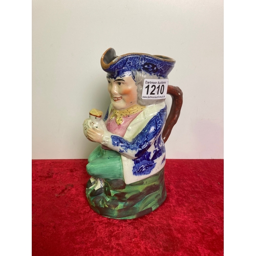 1210 - Decorative toby jug, 20cm tall,