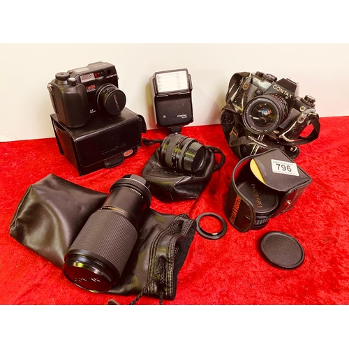 796 - Cameras including a digital Camedia C3030, a cased Contax SLR camera, plus other accessories - one o... 