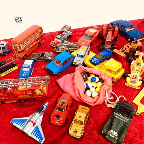 808 - A selection of die cast model toys, trucks and bus