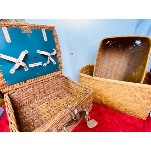 813 - A wicker picnic basket along with 2 other woven baskets