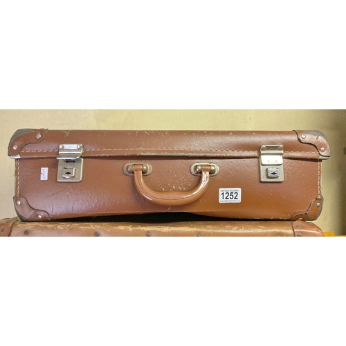 1252 - A leather suitcase