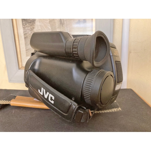 1225 - Vintage JVC EHSC cased camcorder with VHS adaptor tape, along with a flight case containing cables a... 