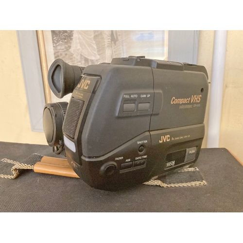 1225 - Vintage JVC EHSC cased camcorder with VHS adaptor tape, along with a flight case containing cables a... 