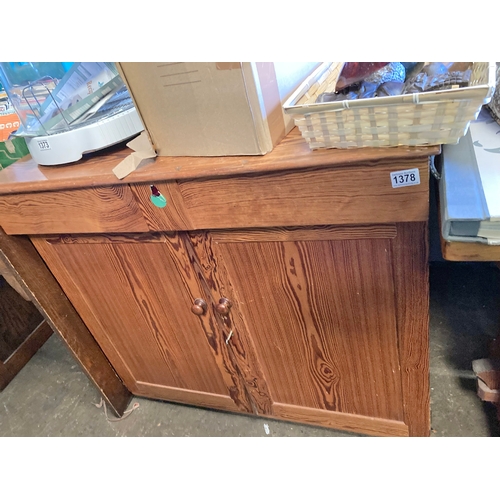 1378 - Small kitchen cupboard  (pine) with a pair of drawers and key and lots of storage space under