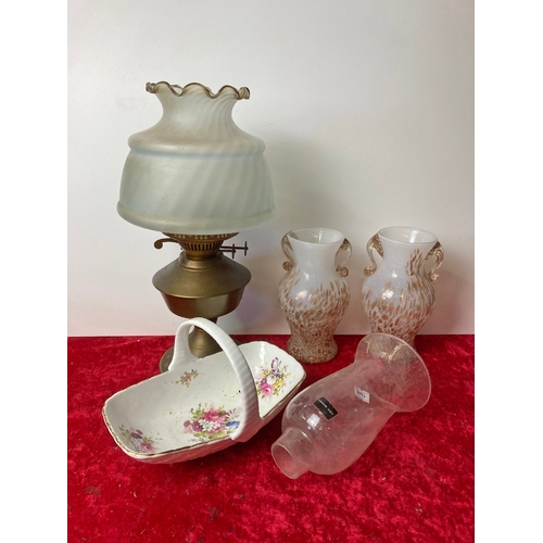 82 - A pair of Italian glass vases along with an oil lamp and a china basket