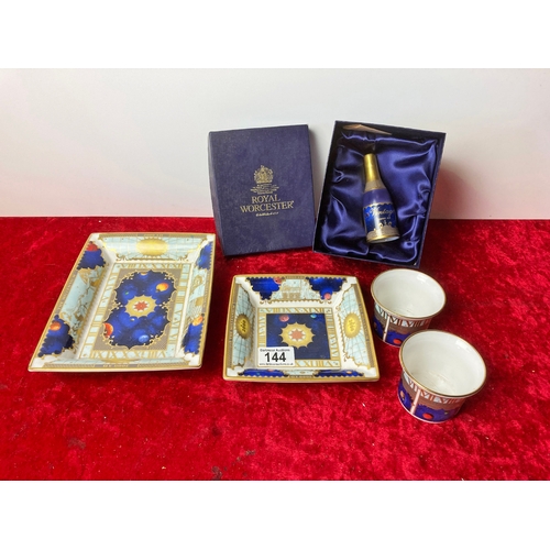 144 - Royal Worcester Millennium collectibles including trinket trays , key light holders and original bot... 