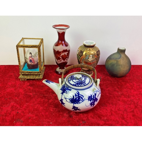 245 - Signed small pottery vase and red glass vase, satsuma vase, painted egg and a blue and white teapot