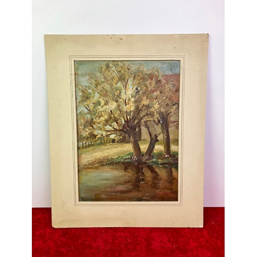 426 - Modern British School. An unframed oil painting. Trees by the riverside 18 x 15 