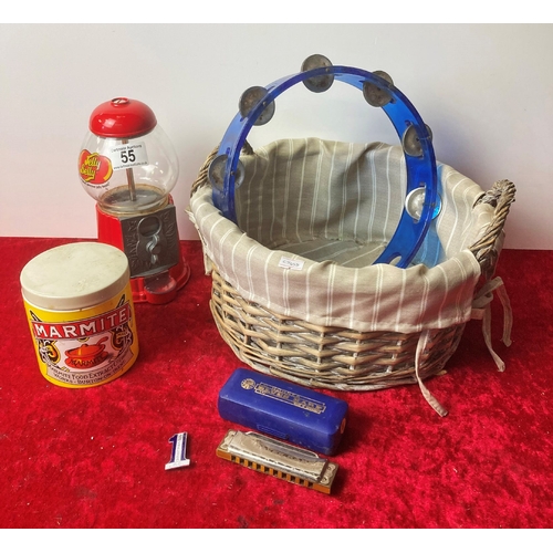 55 - A basket containing Jelly Belly Jelly Bean dispenser, Marmite pot, tambourine and a harmonica