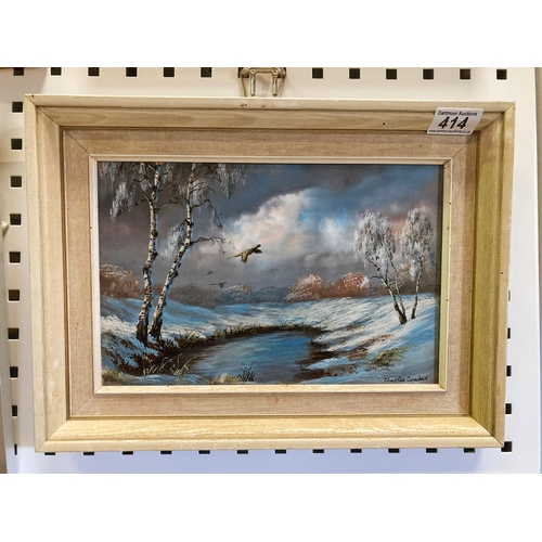 414 - Oil painting of pheasants in flight in a snowy winter landscape, signed Charles Comber 11 x 15