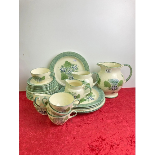 633 - A quantity of Poole pottery, hand painted dinnerware including, dinner plates side plate, cups, sauc... 