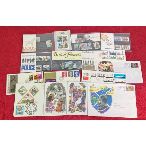 693 - First Day covers, along with packs of commemorative stamps