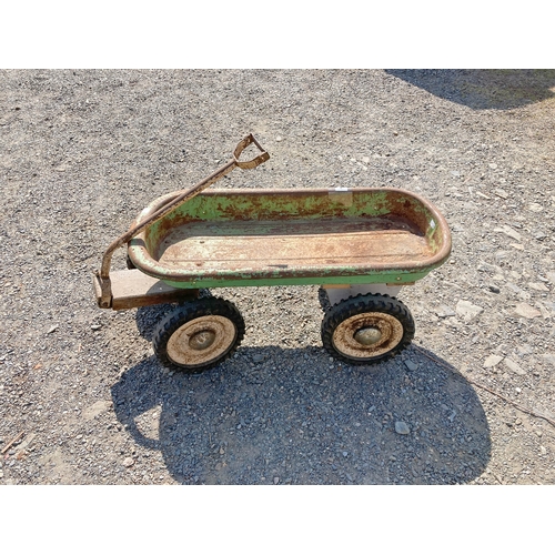 4 - A metal garden trolley with solid wheels - rusty but in working order