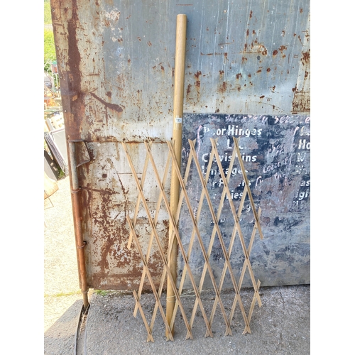 133 - Wooden pole measures 180 cm tall and a piece of garden trellis