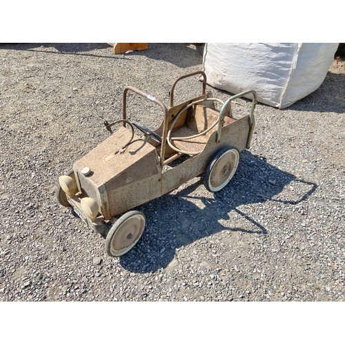 148 - Vintage child's metal pedal car