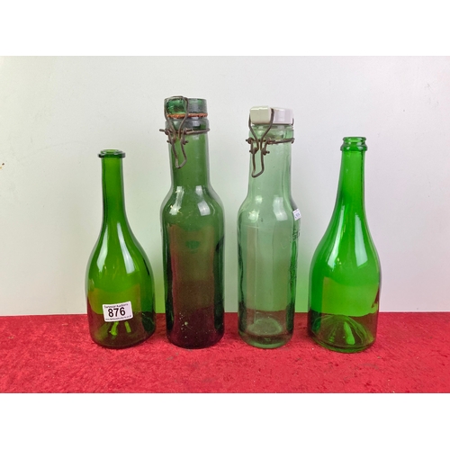 876 - 4 green glass bottles