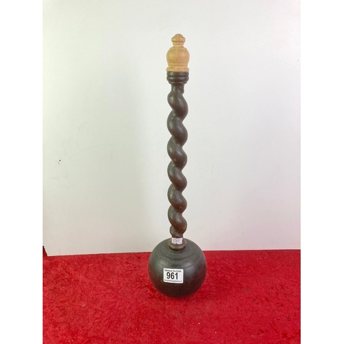 961 - Doorstop made from a bowling ball with a twisted wood handle