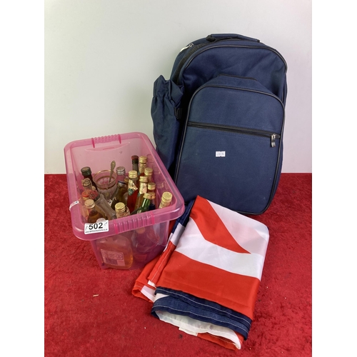 502 - A picnic rucksack, a Union flag and a selection of miniatures