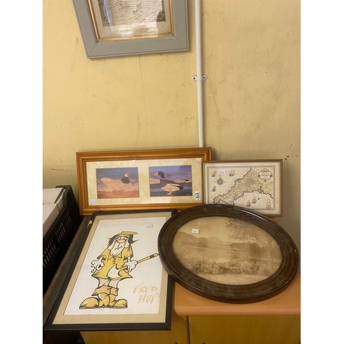 578 - A collection of framed prints including a map of Cornwall and an oval framed antique photograph