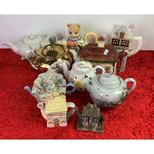 158 - Collection of novelty teapots