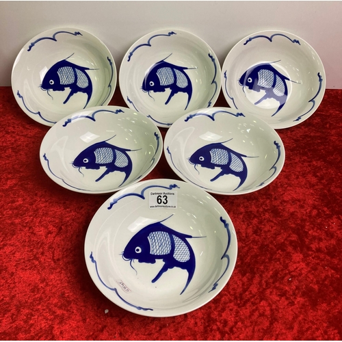 63 - Set of six bowls with blue fish design along with four Chinese style soup spoons