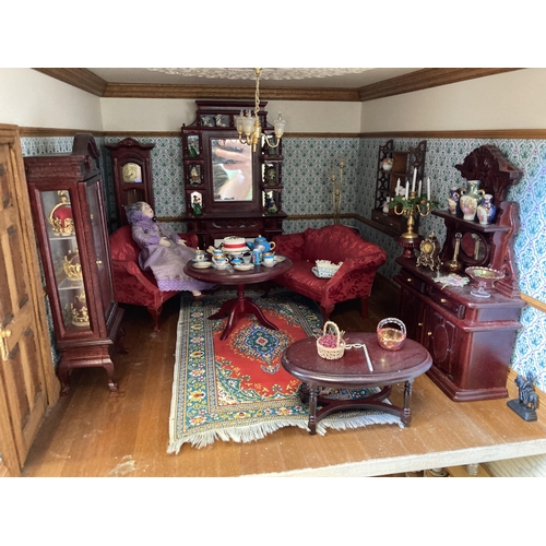 190l - 4-storey dolls house with exceptional detail in furnishings. Flooring lifted in places. Approx 100cm... 