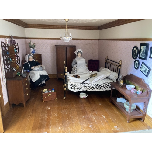 190l - 4-storey dolls house with exceptional detail in furnishings. Flooring lifted in places. Approx 100cm... 