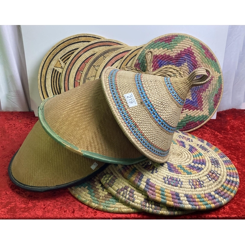 219 - Selection of wicker placemats and Vietnamese-style hats