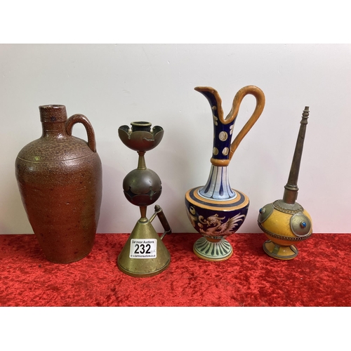 232 - Interesting lot of jugs, a brass candlestick and an eastern urn