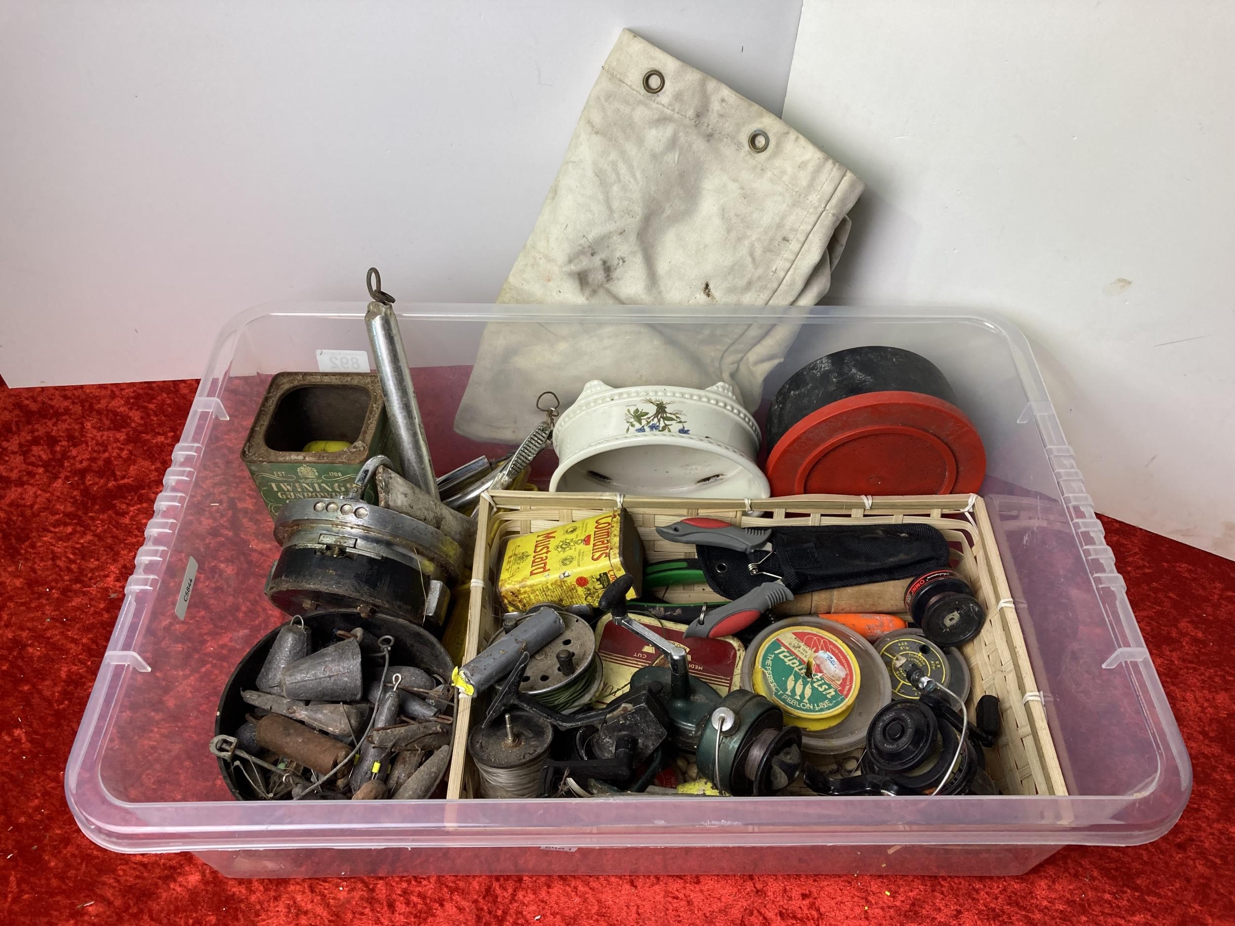 A large box of original lead fishing weights - reels and a fishing