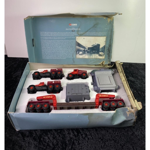 175H - A Corgi Classics heavy haulage set in original box, with multiple trucks and vehicles.  