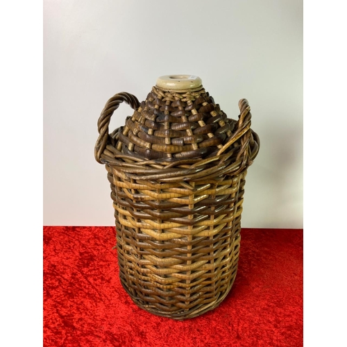 19 - Fabulous wicker basketed cider flagon, great condition. Approx height 41cm.