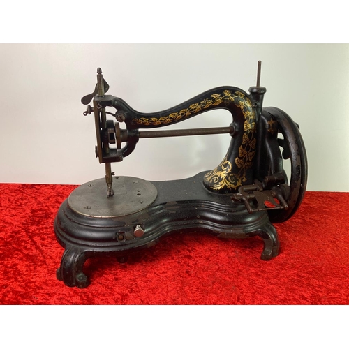 21 - Jones & Compy of Guidebridge nr Manchester hand sewing machine. Runs smoothly. Height approx 23cm, b... 